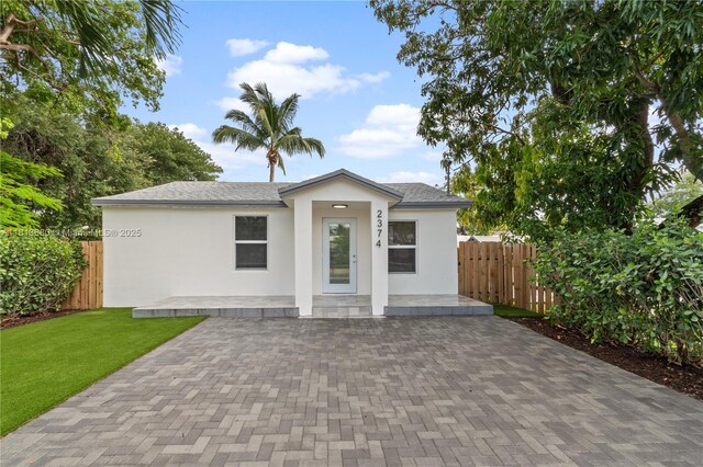 2374 NW 56th St, Miami, FL 33142 - view of front of home featuring stucco siding