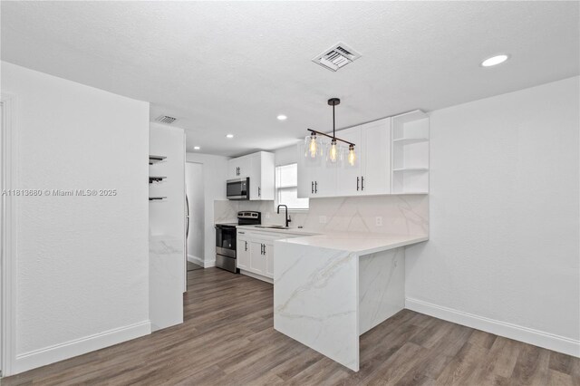 2374 NW 56th St, Miami, FL 33142 - kitchen featuring stainless steel appliances, open shelves, white cabinets, baseboards, and recessed lighting