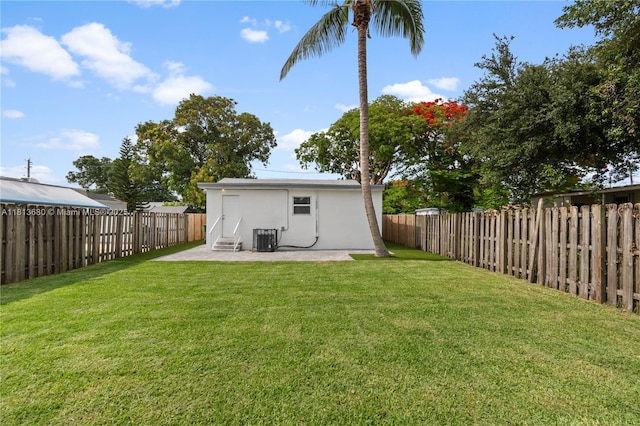 2374 NW 56th St, Miami, FL 33142 - rear view of property with stucco siding, a patio, and cooling unit