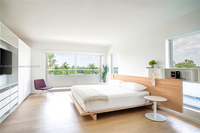 10250 Collins Ave Unit Ph1, Bal Harbour, FL 33154 - bedroom with wood finished floors