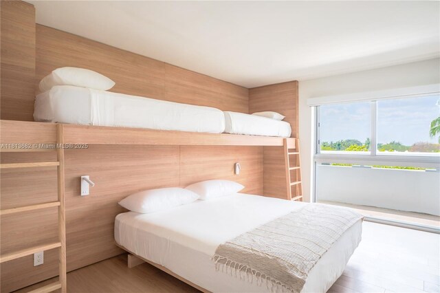 10250 Collins Ave Unit Ph1, Bal Harbour, FL 33154 - bedroom with wood finished floors