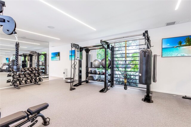 10250 Collins Ave Unit Ph1, Bal Harbour, FL 33154 - workout area featuring baseboards
