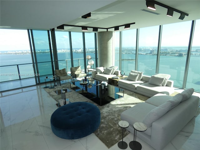 3131 NE 7th Ave Unit Ph4901, Miami, FL 33137 - living room with a water view, marble finish flooring, and floor to ceiling windows