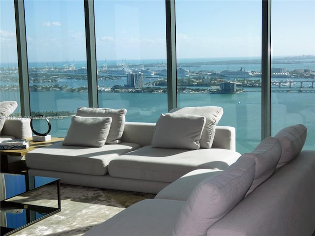3131 NE 7th Ave Unit Ph4901, Miami, FL 33137 - living room with floor to ceiling windows, a view of city, and a water view