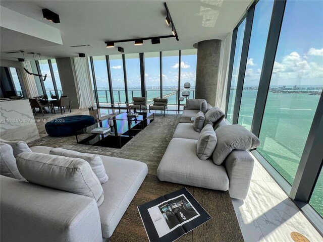 3131 NE 7th Ave Unit Ph4901, Miami, FL 33137 - living area with floor to ceiling windows and a water view