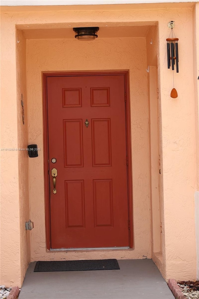 20816 NW 2nd St, Pembroke Pines, FL 33029 - doorway to property with stucco siding