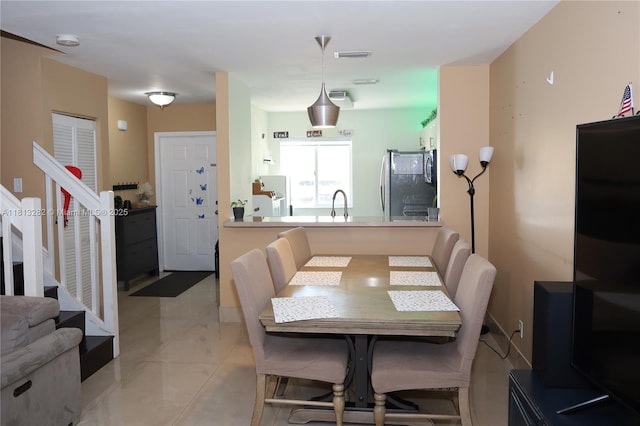 20816 NW 2nd St, Pembroke Pines, FL 33029 - dining space with stairway
