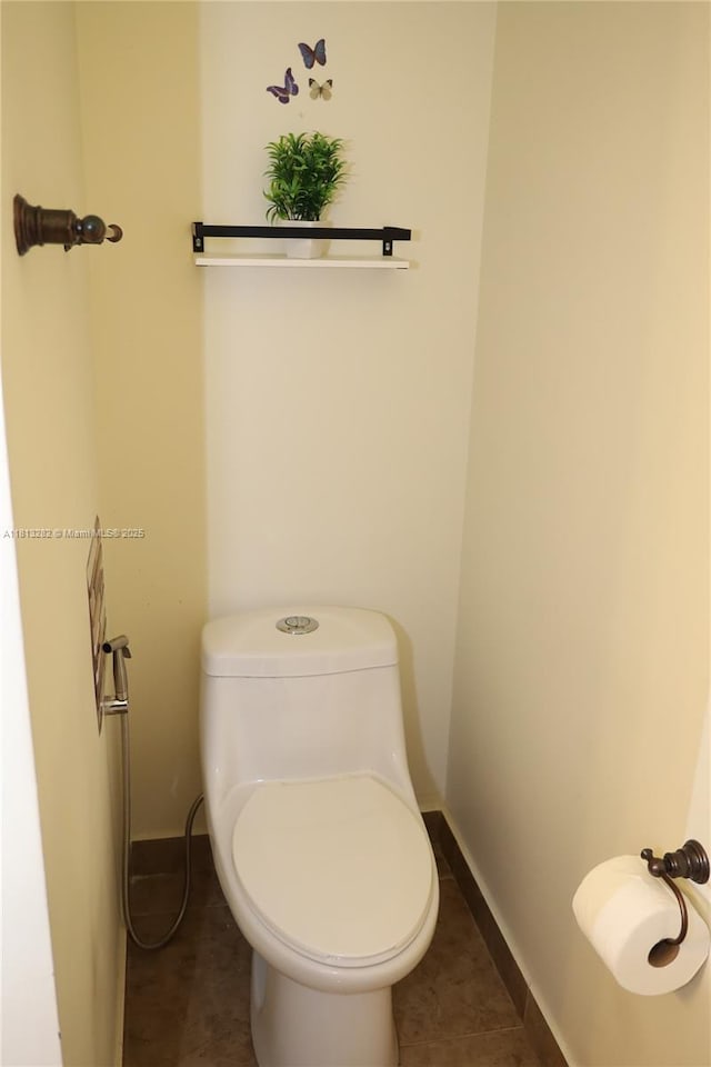 20816 NW 2nd St, Pembroke Pines, FL 33029 - bathroom featuring toilet, baseboards, and tile patterned flooring