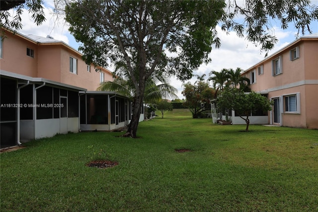 20816 NW 2nd St, Pembroke Pines, FL 33029 - view of green lawn featuring a sunroom