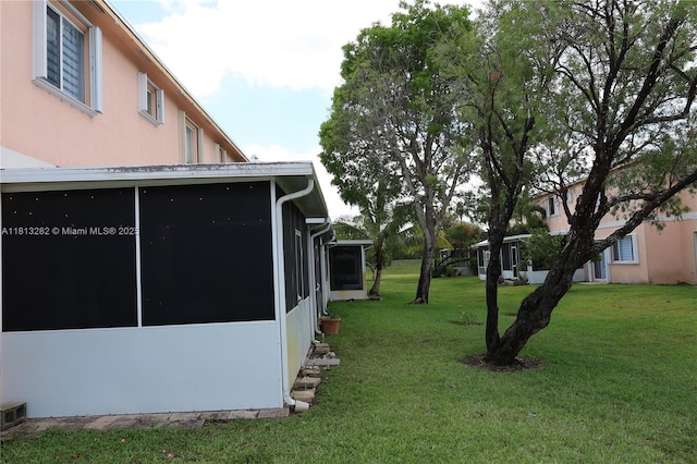 20816 NW 2nd St, Pembroke Pines, FL 33029 - view of grassy yard with a sunroom