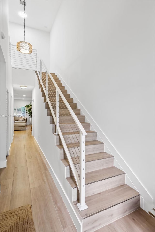 3229 Canal Dr, Pompano Beach, FL 33062 - staircase with wood finished floors and baseboards