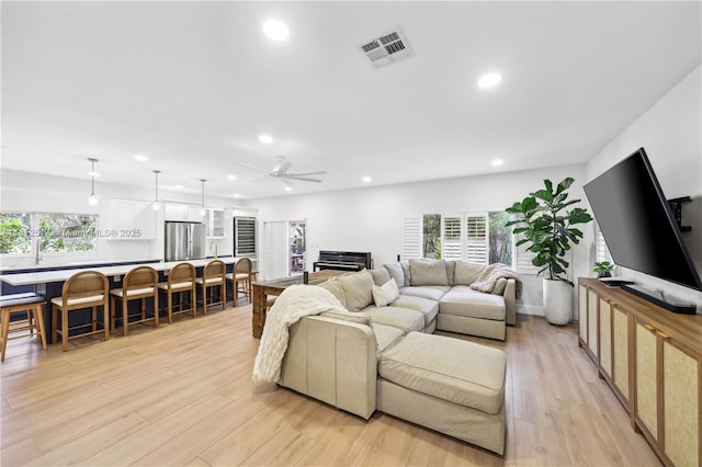 3229 Canal Dr, Pompano Beach, FL 33062 - living room with recessed lighting, a ceiling fan, and light wood finished floors
