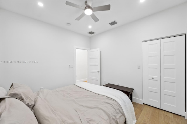 3229 Canal Dr, Pompano Beach, FL 33062 - bedroom featuring recessed lighting, light wood-style floors, a closet, and a ceiling fan