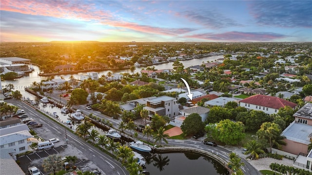 3229 Canal Dr, Pompano Beach, FL 33062 - aerial perspective of suburban area featuring a large body of water