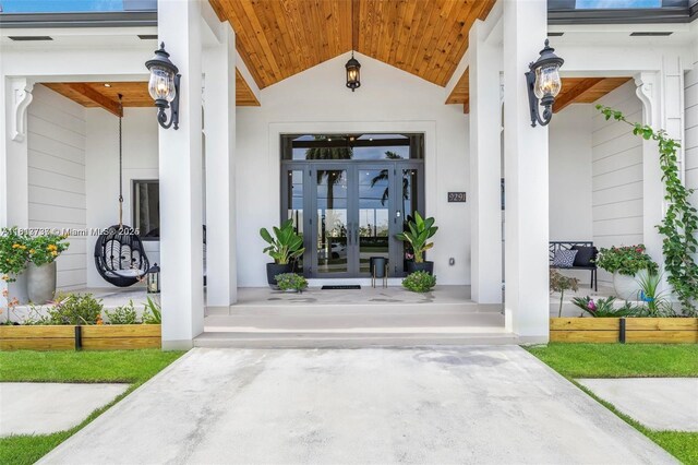 9291 SW 88th St, Miami, FL 33176 - property entrance with french doors and covered porch