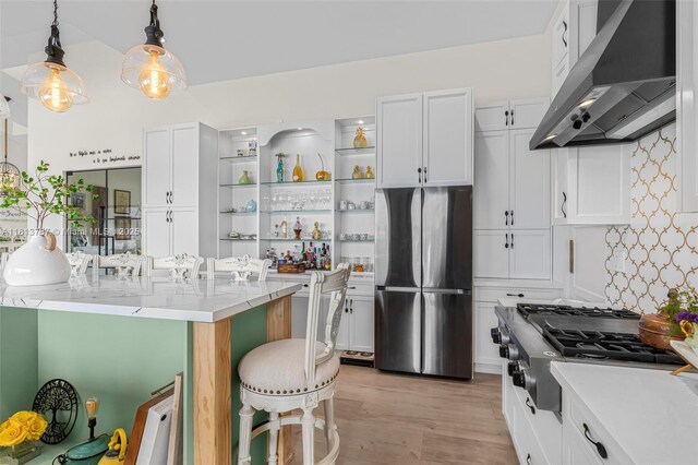 9291 SW 88th St, Miami, FL 33176 - kitchen featuring stainless steel appliances, extractor fan, open shelves, and white cabinets
