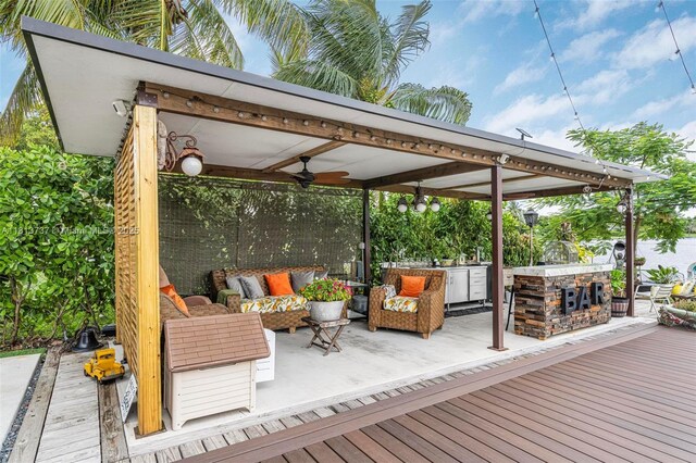 9291 SW 88th St, Miami, FL 33176 - wooden terrace with outdoor lounge area, a gazebo, a ceiling fan, and area for grilling
