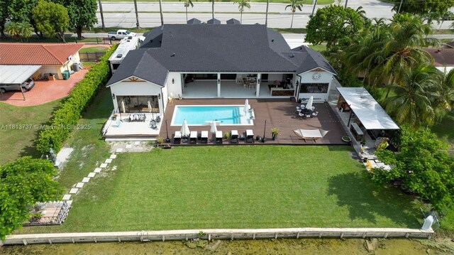 9291 SW 88th St, Miami, FL 33176 - outdoor pool featuring a patio and a yard