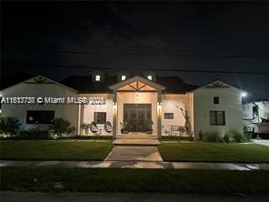 9291 SW 88th St, Miami, FL 33176 - view of front of home featuring a lawn