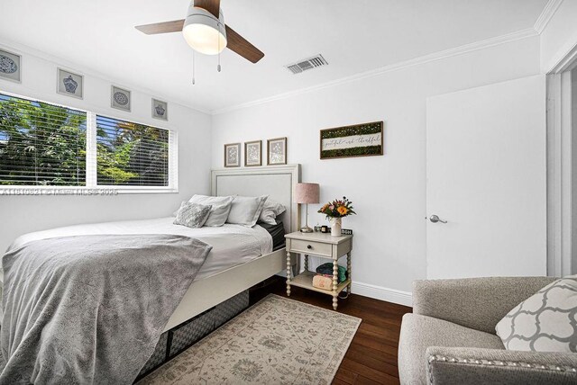 1450 Ortega Ave, Coral Gables, FL 33134 - bedroom with ornamental molding, dark wood-type flooring, baseboards, and ceiling fan