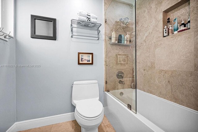 1450 Ortega Ave, Coral Gables, FL 33134 - full bathroom featuring toilet, shower / bath combination, baseboards, and tile patterned flooring