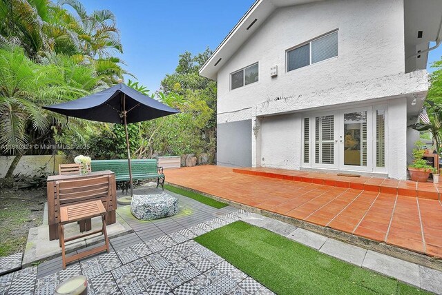 1450 Ortega Ave, Coral Gables, FL 33134 - view of patio with french doors