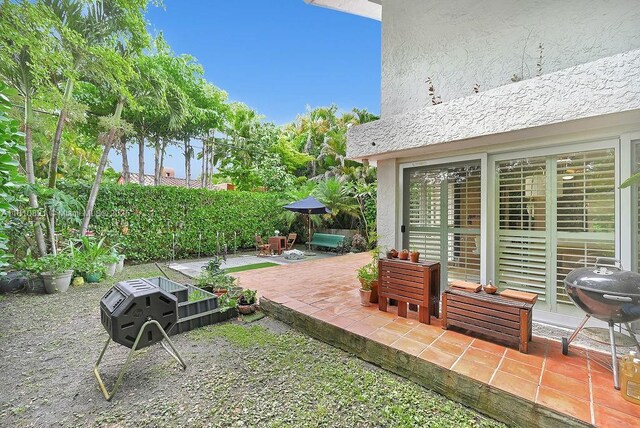 1450 Ortega Ave, Coral Gables, FL 33134 - view of patio featuring area for grilling