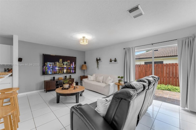 14011 SW 151st Ave, Miami, FL 33196 - living room with plenty of natural light, light tile patterned floors, and a textured ceiling