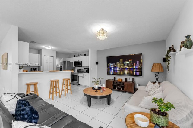 14011 SW 151st Ave, Miami, FL 33196 - living area with light tile patterned flooring