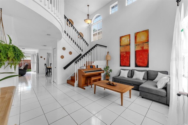 14011 SW 151st Ave, Miami, FL 33196 - living area with stairway, light tile patterned flooring, and a high ceiling