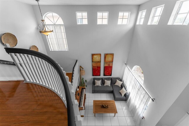 14011 SW 151st Ave, Miami, FL 33196 - tiled foyer featuring a towering ceiling and baseboards