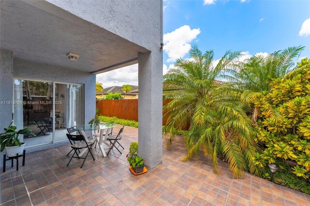 14011 SW 151st Ave, Miami, FL 33196 - view of patio featuring outdoor dining space