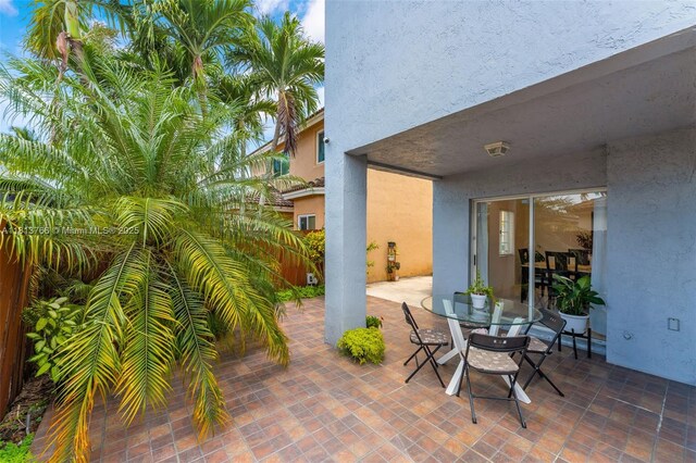 14011 SW 151st Ave, Miami, FL 33196 - view of patio with outdoor dining area