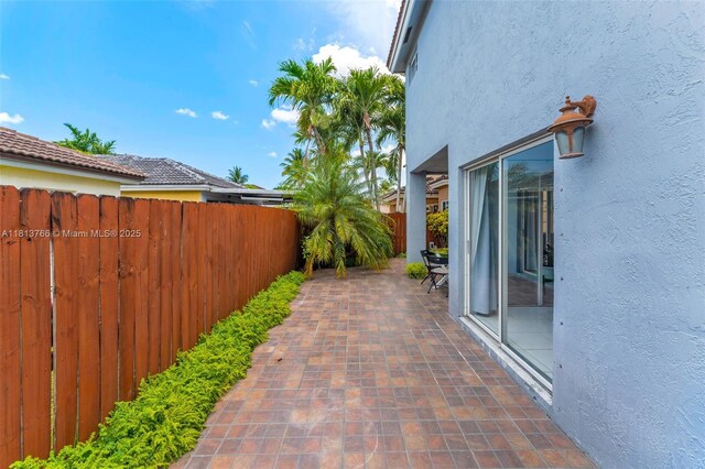 14011 SW 151st Ave, Miami, FL 33196 - fenced backyard with a patio