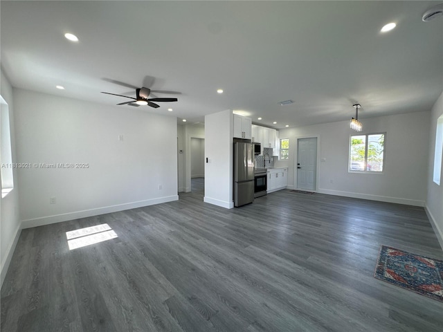 5450 SW 6th St, Miami, FL 33134 - unfurnished living room with baseboards, recessed lighting, dark wood-style flooring, and ceiling fan