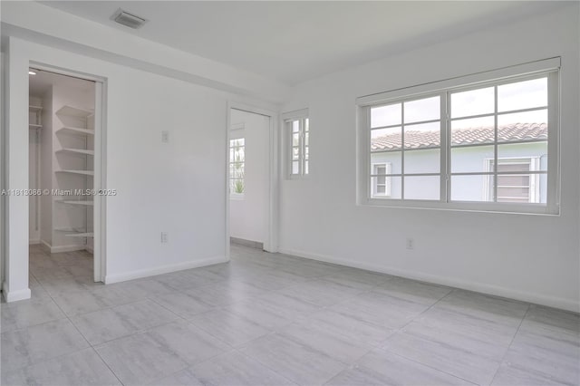 1201 S Biscayne Point Rd, Miami Beach, FL 33141 - empty room with baseboards