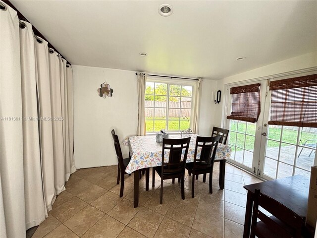 6907 SW 22nd Ct, Miramar, FL 33023 - dining area with french doors, tile patterned flooring, and recessed lighting