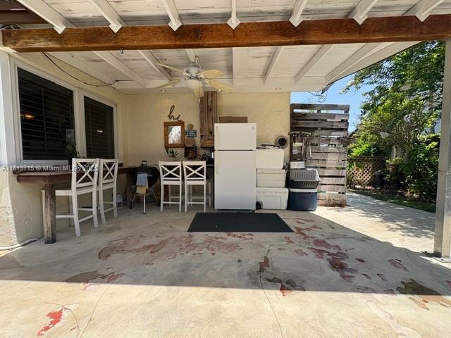 13324 SW 100th Ter, Miami, FL 33186 - view of patio / terrace featuring ceiling fan