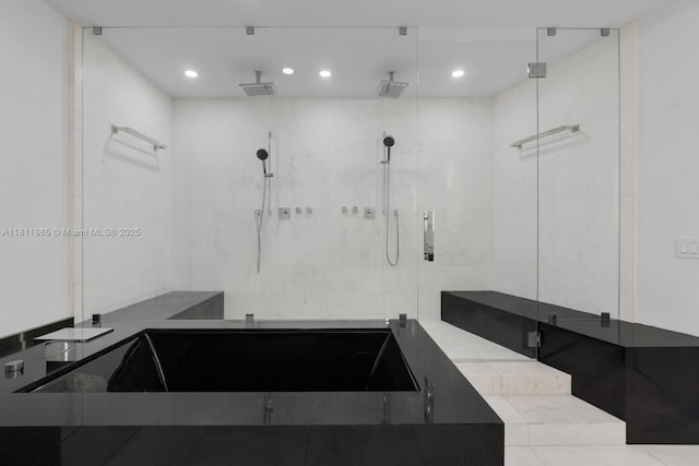 18555 Collins Ave Unit 1703, Sunny Isles Beach, FL 33160 - bathroom with a stall shower and recessed lighting