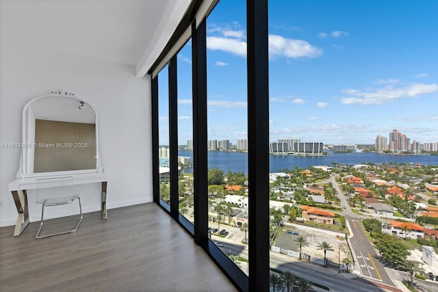 18555 Collins Ave Unit 1703, Sunny Isles Beach, FL 33160 - unfurnished sunroom with a water view and a city view