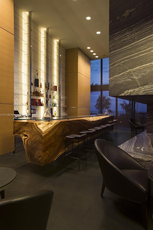 18555 Collins Ave Unit 1703, Sunny Isles Beach, FL 33160 - community bar area with concrete floors, recessed lighting, and floor to ceiling windows