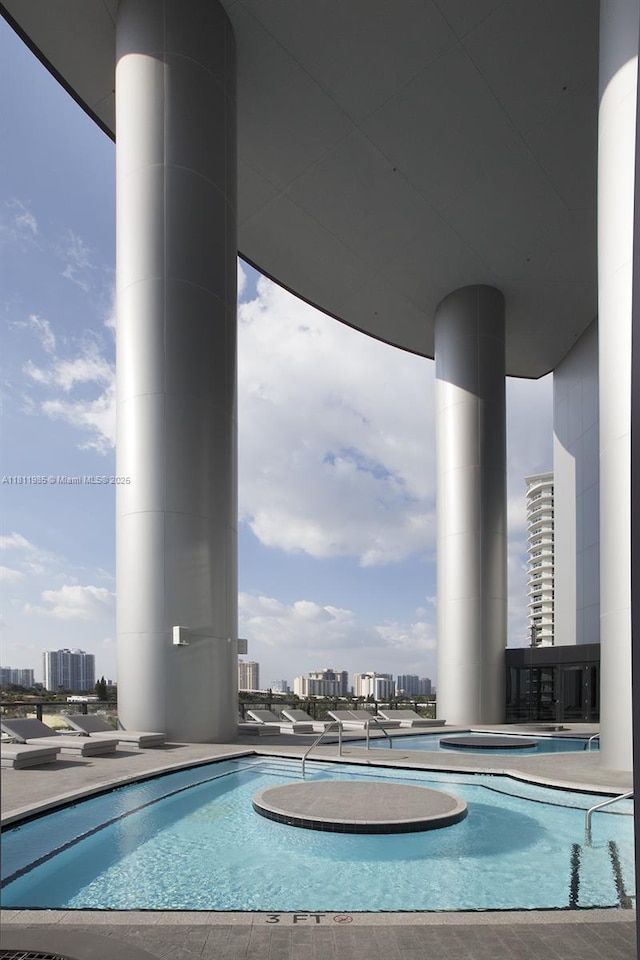 18555 Collins Ave Unit 1703, Sunny Isles Beach, FL 33160 - community pool with a view of city and central AC unit