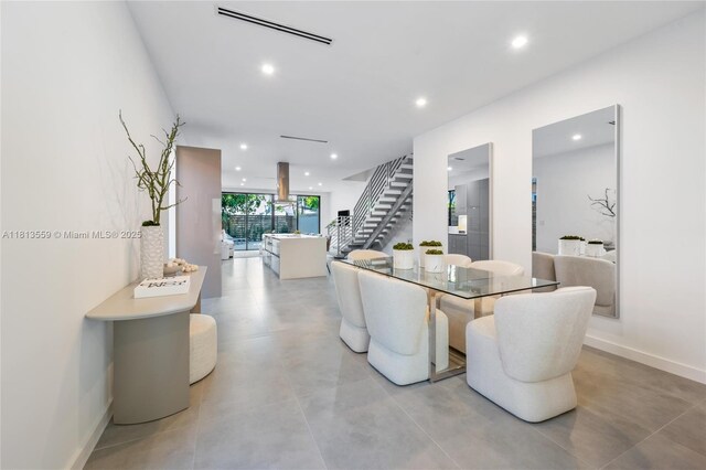 1201 SW 23rd St Right, Unit Right, Miami, FL 33145 - dining space with stairs, recessed lighting, concrete floors, and baseboards