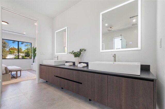 1201 SW 23rd St Right, Unit Right, Miami, FL 33145 - full bathroom featuring double vanity, baseboards, concrete flooring, and recessed lighting