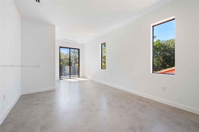 1201 SW 23rd St Right, Unit Right, Miami, FL 33145 - unfurnished room featuring baseboards and concrete floors