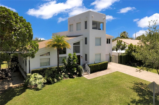 6320 Dolphin Dr, Coral Gables, FL 33158 - view of front facade featuring stucco siding