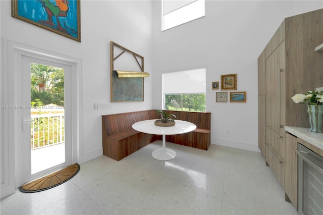6320 Dolphin Dr, Coral Gables, FL 33158 - bathroom featuring a towering ceiling and beverage cooler