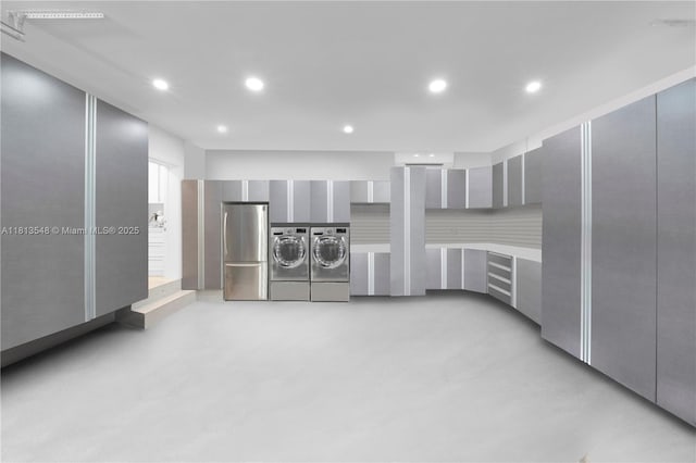 6320 Dolphin Dr, Coral Gables, FL 33158 - below grade area featuring independent washer and dryer, freestanding refrigerator, and recessed lighting