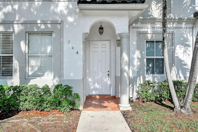 5440NW 107th Ave Unit 204, Doral, FL 33178 - view of exterior entry with stucco siding
