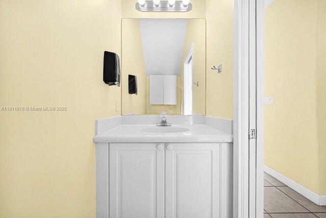 5440NW 107th Ave Unit 204, Doral, FL 33178 - bathroom with tile patterned floors, vanity, and baseboards